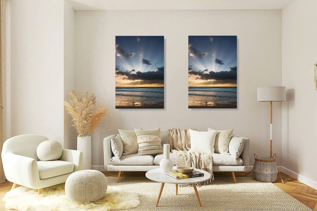 A diptych showcases the serene scene at Bronte Beach, with each vertical photo capturing the seagull against the backdrop of the sun's rays breaking through the clouds. This zen artwork enhances the room's atmosphere, offering a visual representation of peace and natural harmony.