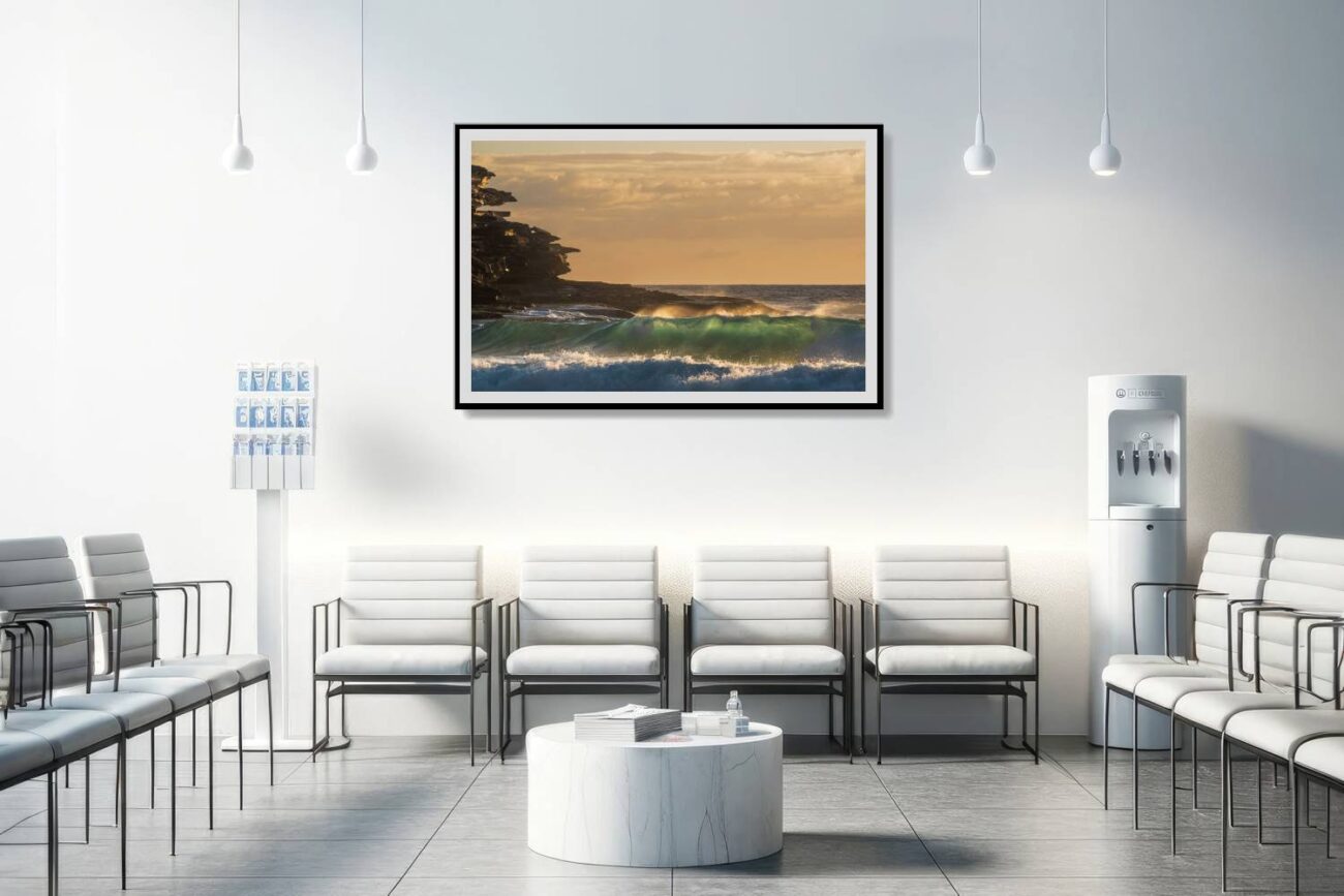 In the medical office, a framed art piece captures the sunrise at Tamarama Beach with rocky cliffs silhouetted against the sky, presented as wave art. This artwork adds a sense of peace and natural splendor to the environment, aiding in creating a calming and restorative space for patients and staff.