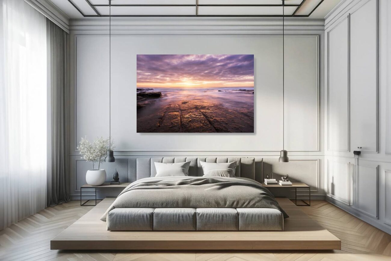 Bedroom art: Sunrise at Bulgo Beach, depicted in warm orange and soothing lavender hues, creating a peaceful bedroom atmosphere.