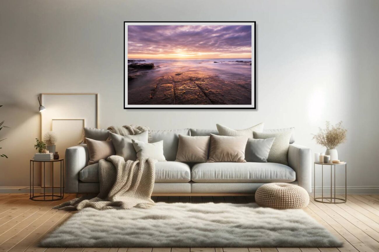 Living room art: "Apollo's Glory" at Bulgo Beach sunrise, captured in warm orange tones, perfect as orange and lavender wall art for the living room.