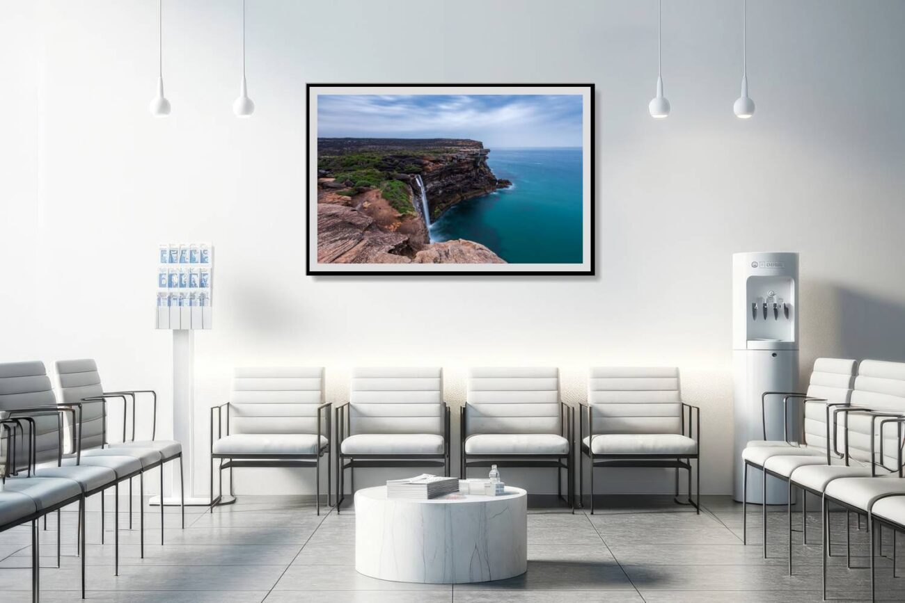 Medical office art: Soothing artwork featuring Eagle Rock's waterfall plunging into the sea, framed by cliffs, ideal for calming medical environments.
