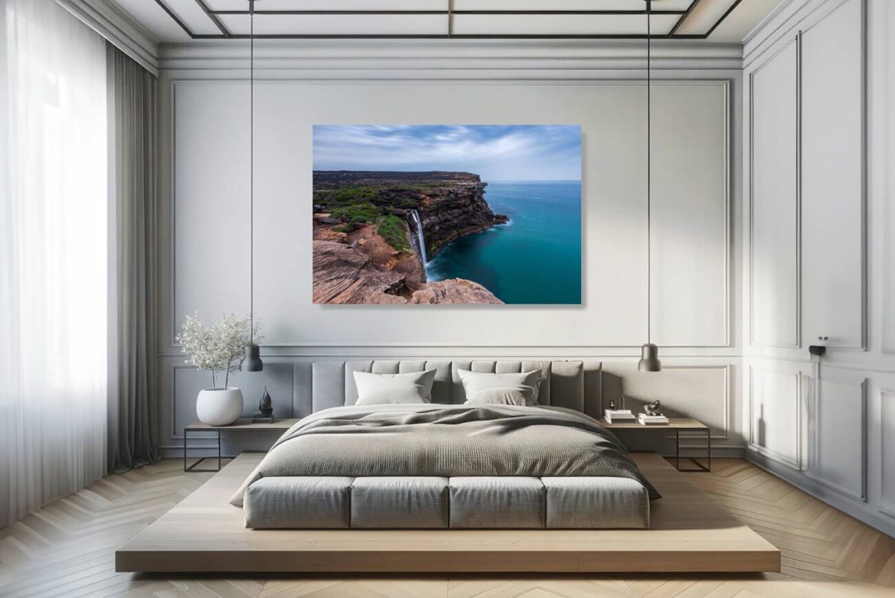 Bedroom art: Eagle Rock's waterfall cascading into the sea, surrounded by cliffs, creates a tranquil and majestic scene for bedroom relaxation.