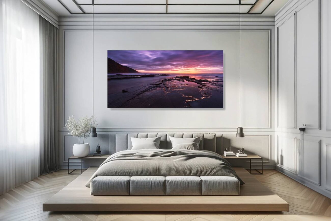 Bedroom art: Serene sunrise in pink and purple hues at Bulgo Beach, symmetry reflected in calm waters, ideal for peaceful bedroom ambiance.
