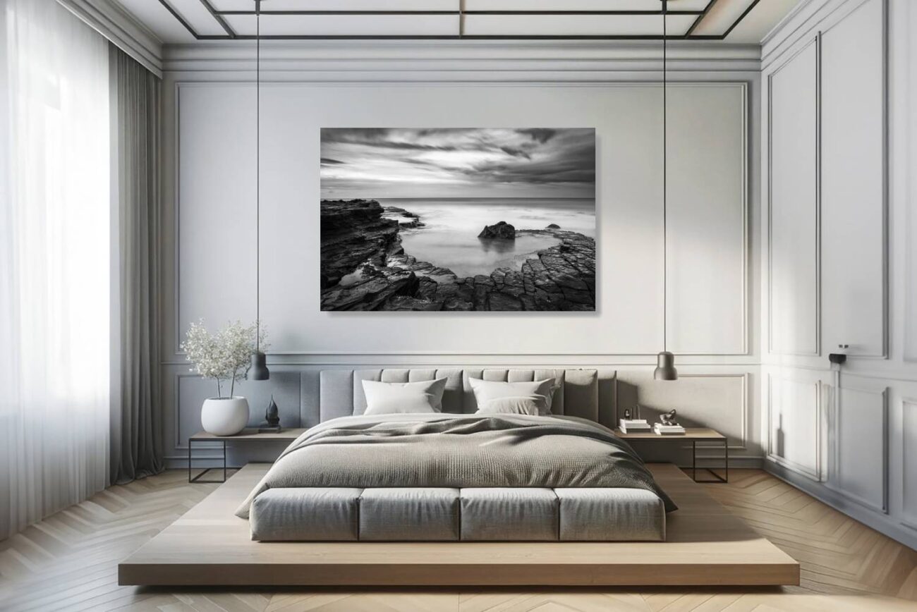Bedroom art: Black and white photo from Garie Beach, capturing a zen-like spiral of rocks and waves, perfect for creating a peaceful bedroom environment.