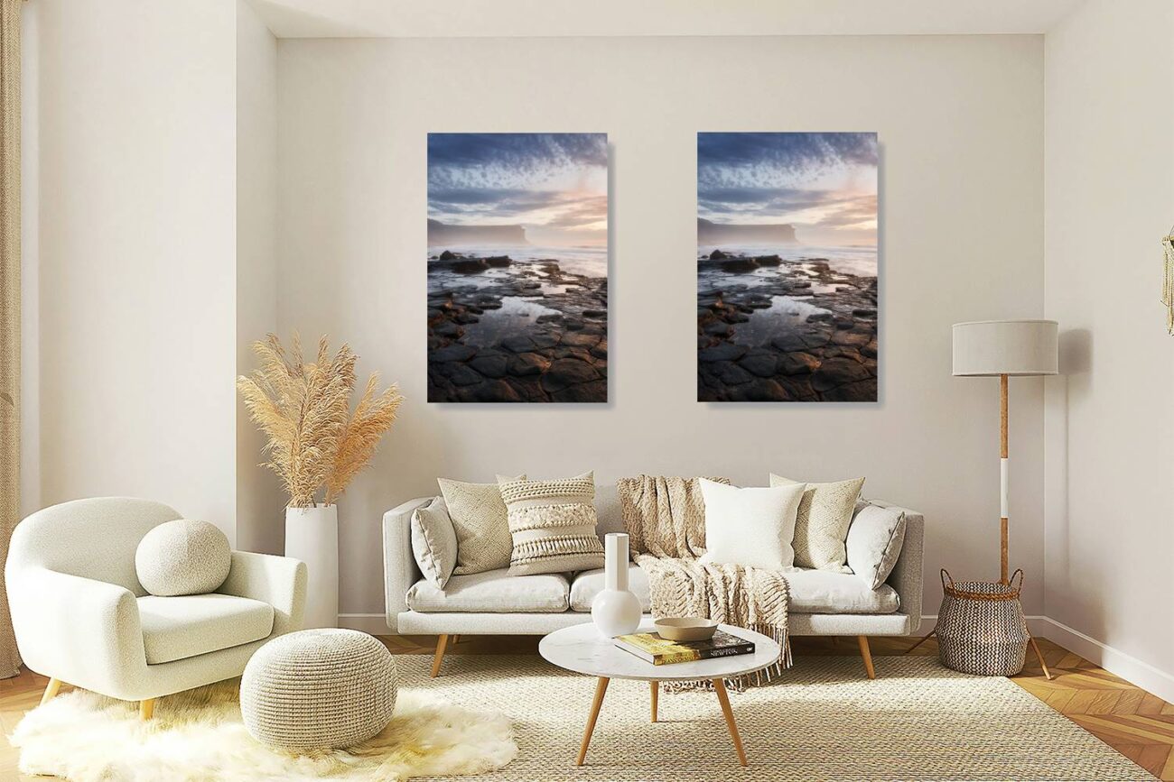 Living room art: Sunrise casts a golden glow on Garie Beach's rocky shore, a captivating coastal photograph for the living room.