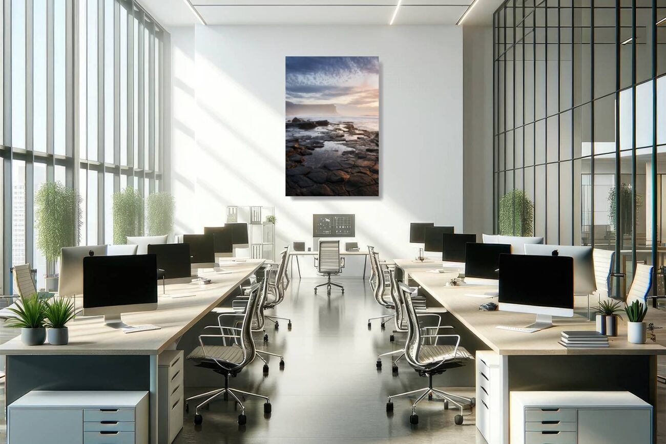 Office art: Coastal photograph of Garie Beach at sunrise with golden light on rocks, enhancing office ambiance.