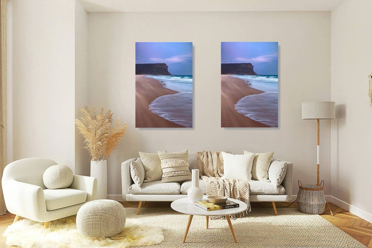 Living room art: Minimalist art of a serene sunset at Garie Beach, featuring soft blue skies and gentle waves over sandy shores, perfect for living room decor.