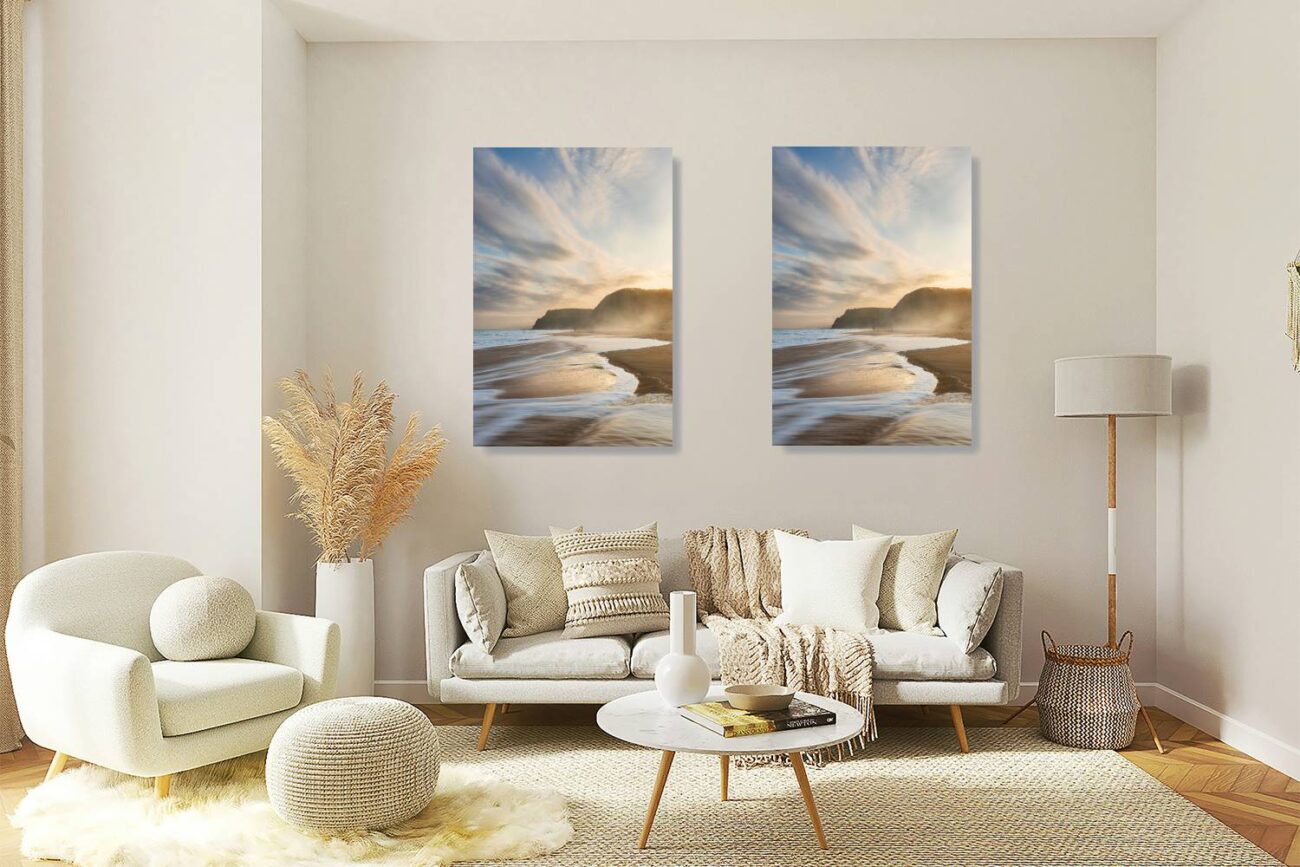 Living room art: Sunset at Garie Beach, a dreamscape of soft blue and pale orange streaked clouds over the tranquil sea, presented as vibrant orange wall art.