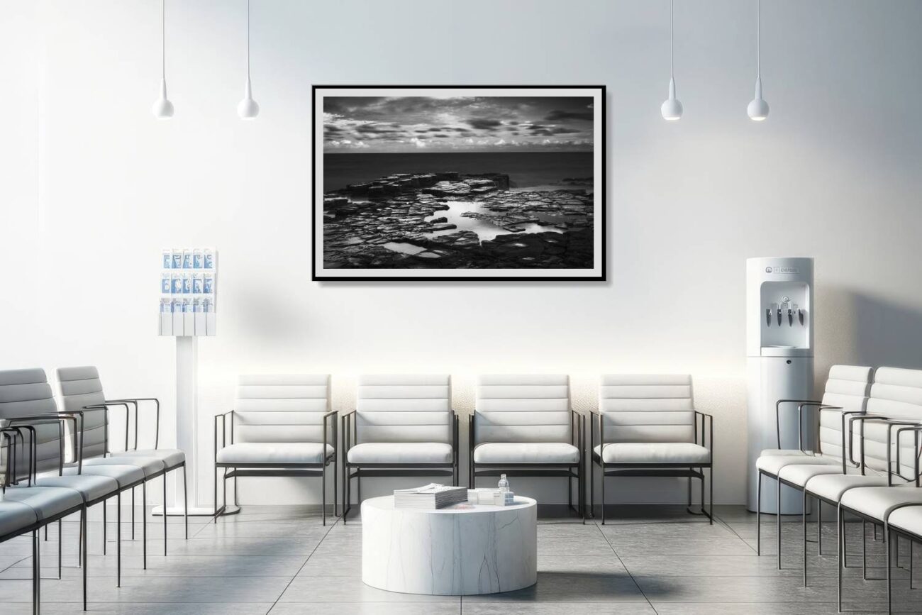 Medical office art: Garie Beach's "Charcoal Twilight," a layered monochrome sunset in black and white, soothing for medical environments.