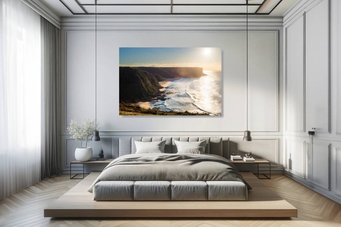 Bedroom art: Peaceful morning photo of the sun rising over Little Garie Beach, golden light on cliffs and waters, ideal for bedroom tranquility.