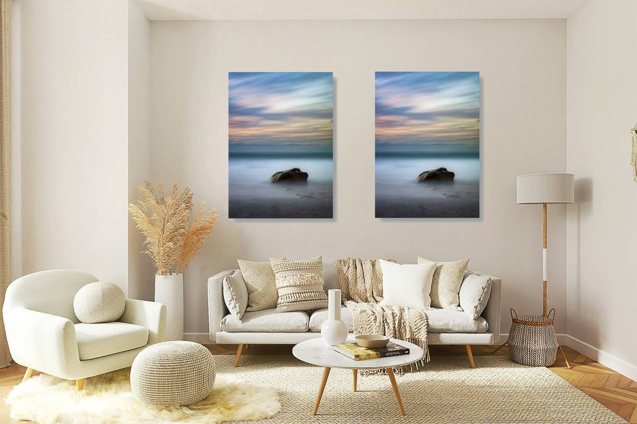 Living room art: Peaceful sunrise at Werrong Beach, a lone rock amidst soft waves, captured in minimalist wall art for a serene living room atmosphere.