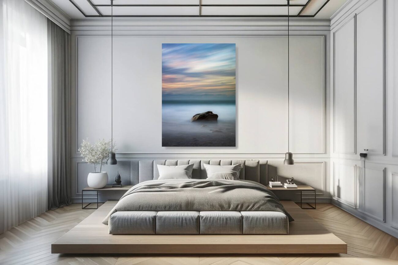 Bedroom art: Minimalist wall art of a lone rock at Werrong Beach during a tranquil sunrise, perfect for creating a calm bedroom environment.