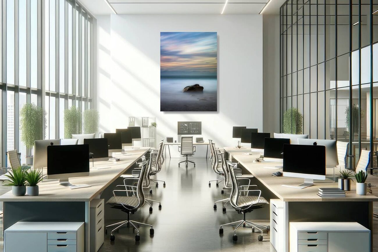 Office art: Werrong Beach at sunrise, featuring a solitary rock among gentle waves, in minimalist wall art to enhance office tranquility.