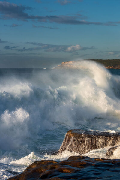 Mahon Pool comes alive with the fervent energy of waves rushing to greet the golden sunrise.