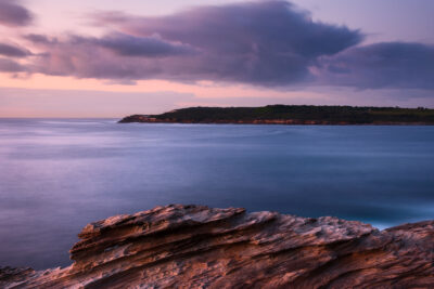The pre-sunrise scene at Mahon Pool with indigo skies and a promise of pink light on the horizon.