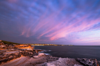 Sunrise at Malabar Headland National Park with vibrant violet and pink sky, resembling dragon's breath.