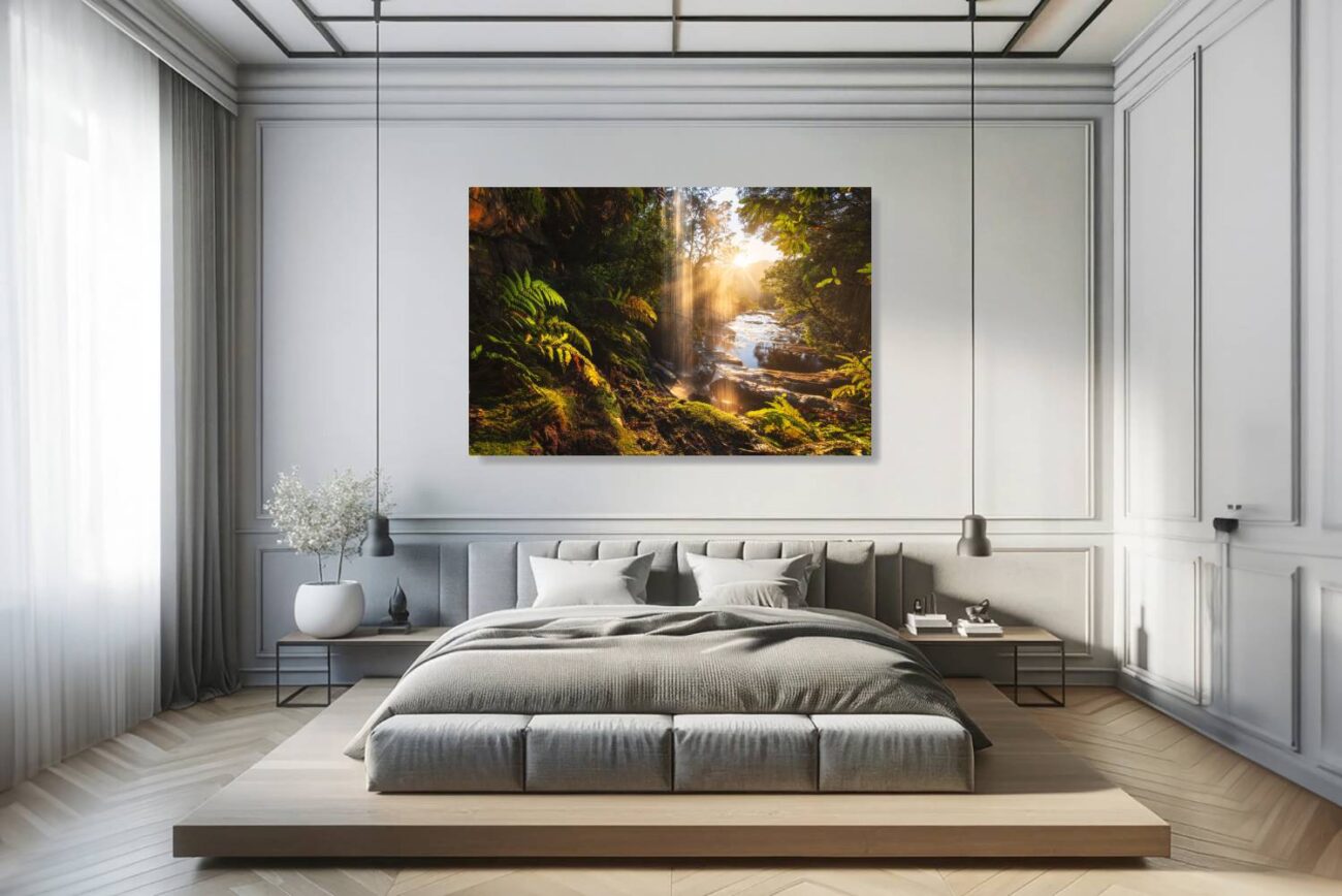 Bedroom art: Peaceful sunrise captured in "Sunbeam Forest Ritual," seen from under a waterfall, ideal for creating a serene bedroom environment.