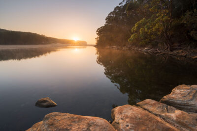 Tranquil Morning Zen captured in sunrise artwork at Wattamolla, with serene reflections.